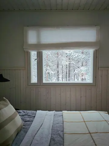 Double bed under the window in the ground-floor bedroom