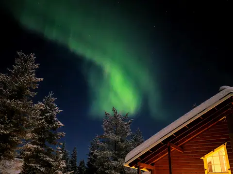 Northern lights seen from the terrace of Chalet Nulkka